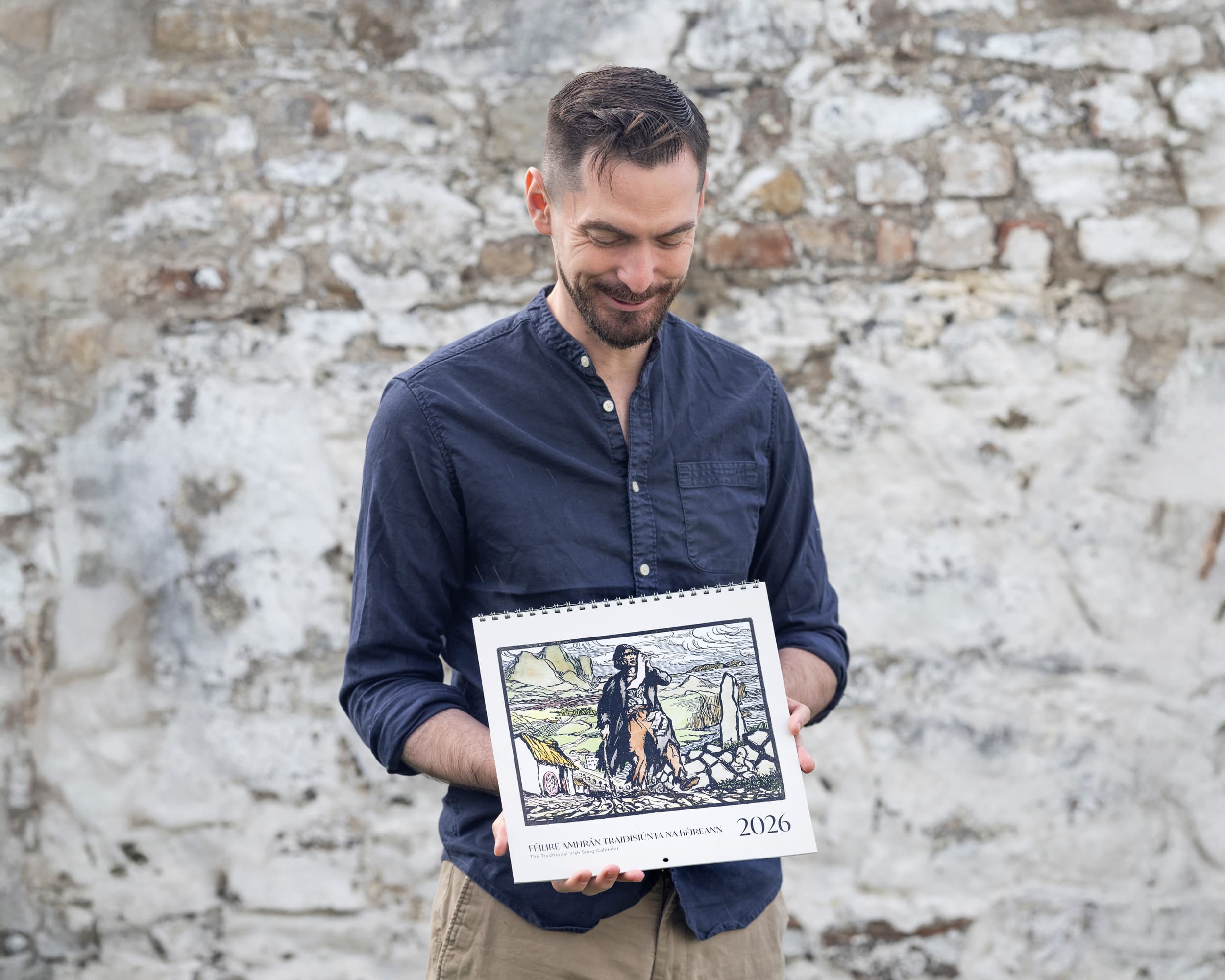 Portrait of author holding calendar